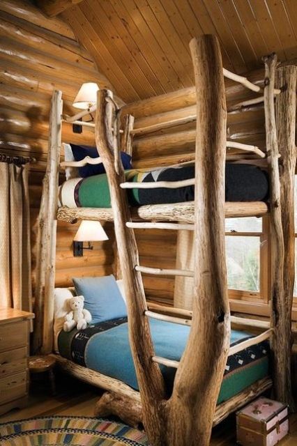 a rough wood kid bed that reminds of a mountain chalet
