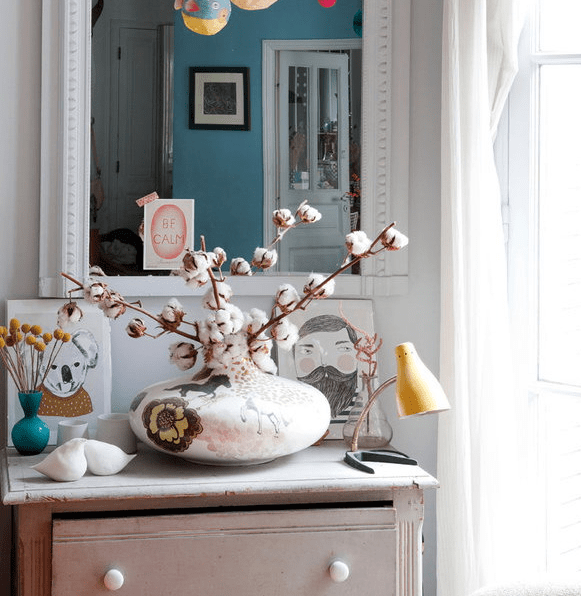 whitewashed shabby mirror over the dresser