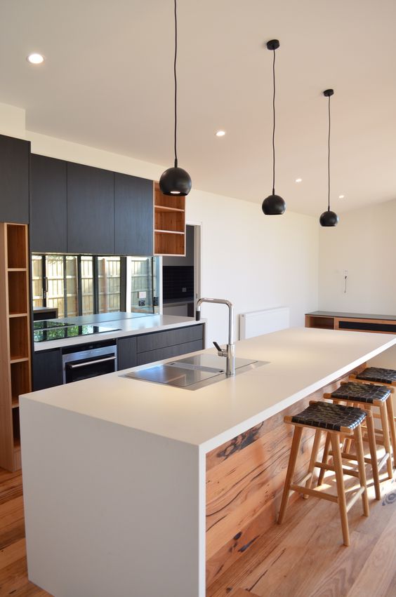 minimalist kitchen island with a dining top