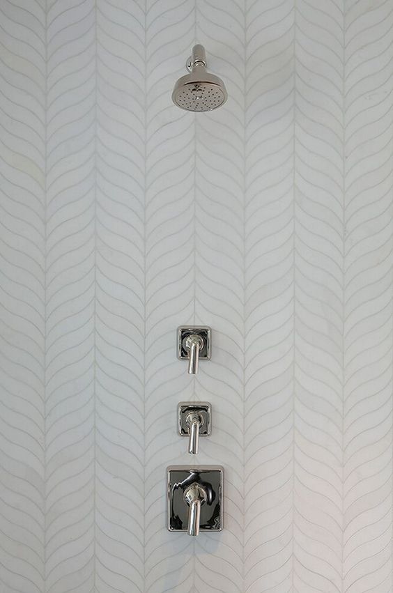 feather herringbone shower tiles