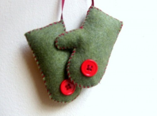 green felt mittens with red buttons are fun and whimsical Christmas ornaments to rock
