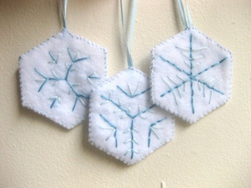white snowflake Christmas ornaments with blue embroidery are lovely and very delicate, make them yourself