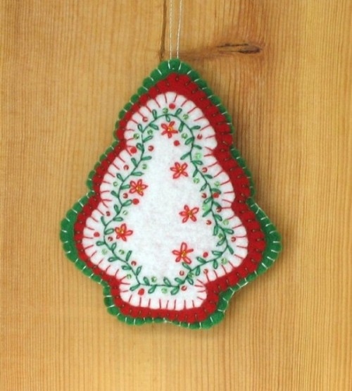 a green, red and white Christmas tree ornament with embroidery is a lovely and bold idea to rock