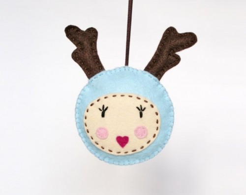 a funny and colorful deer head Christmas ornament with antlers and a cute face is always a cool idea