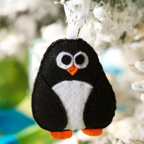 a black and white penguin ornament is a funny and bold idea for Christmas and can be easily made by you anytime