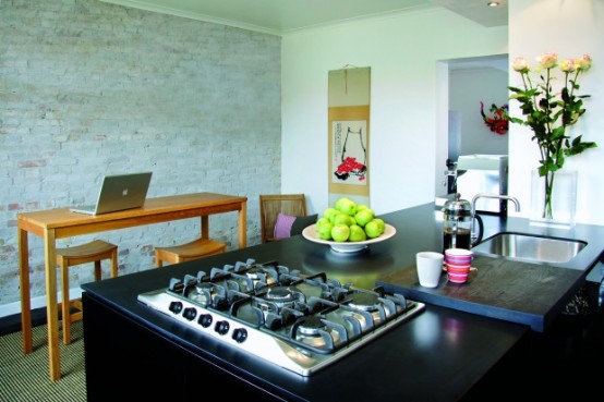 Square Meter Apartment With Completely Black Floors And Some Furniture