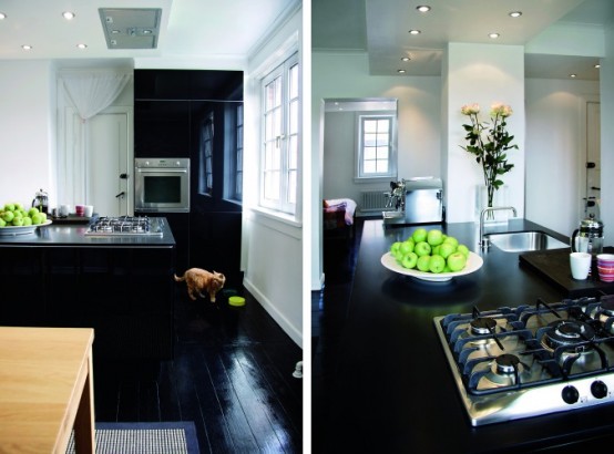 Square Meter Apartment With Completely Black Floors And Some Furniture