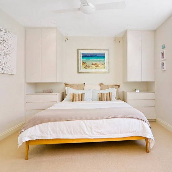 a small bedroom fully done in only neutral shades looks bigger, more inviting and welcoming