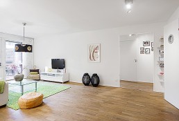 Apartment Interior Design That Combines Black And White Theme With Natural Wood