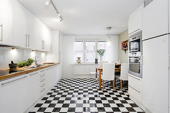 Apartment Interior Design That Combines Black And White Theme With Natural Wood