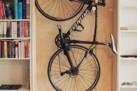 Bike storage between Billy bookcases