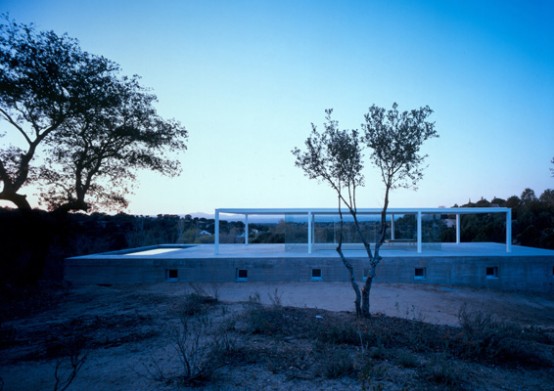 Concrete Box House With Glass Platform On The Top