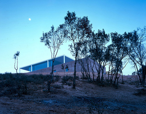Concrete Box House With Glass Platform On The Top