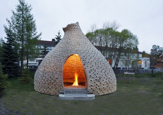 Cool Outdoor Fireplace For Your Garden By Hagen And Zohar 2 554x