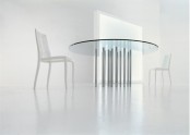 a dining table with a round glass tabletop and multiple metal legs will be a perfect fit for a contemporary or minimalist dining space