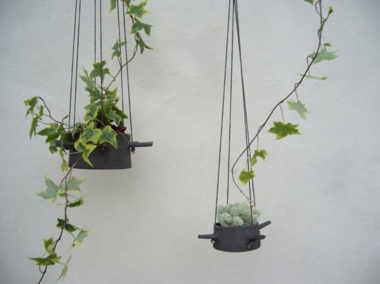 Hanging Flower Pots With Horns From Which They Hangs
