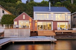 House On Lake That Occupies The Border Between Land And Water