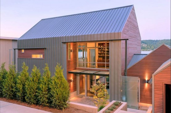 House On Lake That Occupies The Border Between Land And Water