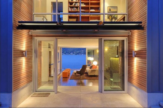 House On Lake That Occupies The Border Between Land And Water