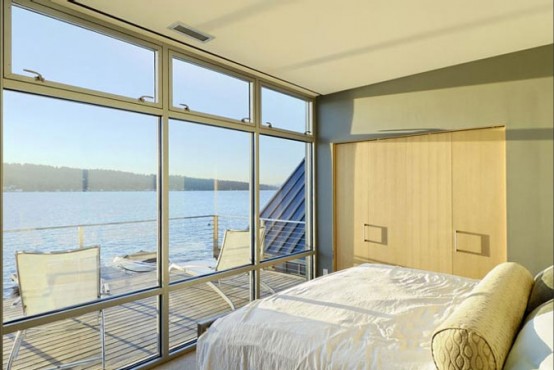 House On Lake That Occupies The Border Between Land And Water