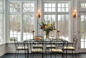 A Dining Room Surrounded By Windows