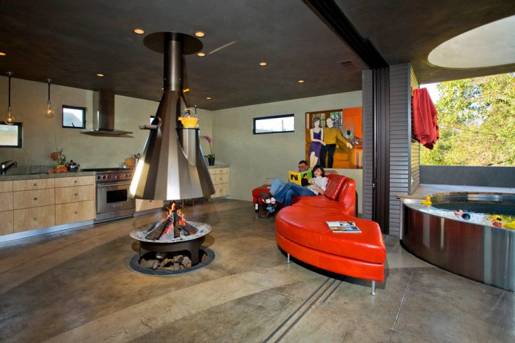a fireplace on a kitchen is definitely an unusual way to design it