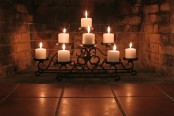 a chic vintage-inspired low candelabra with vignettes for a beautiful fireplace