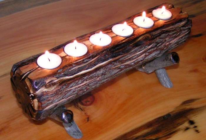 a wooden log with tealights in it and on a stand can be an easy DIY for your fireplace
