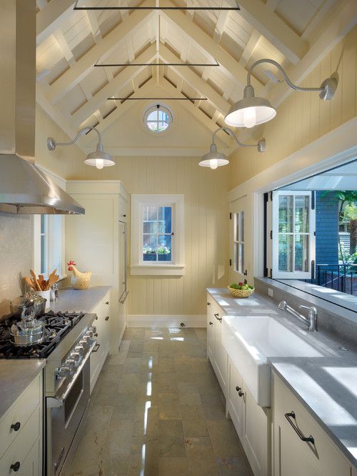 a chic neutral kitchen with a pass through window and windowsill outdoors is a great idea for a modern outdoor space
