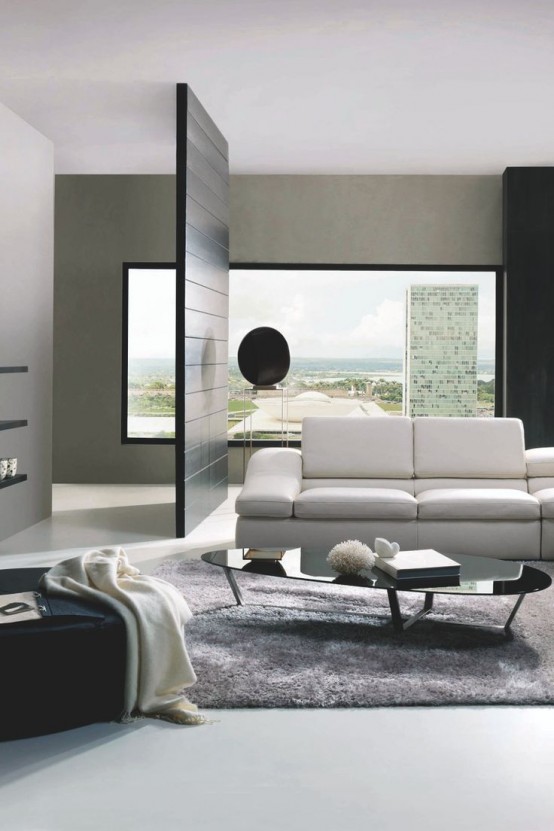 an elegant minimalist living room with a view, a white sofa, black furniture and a grey rug
