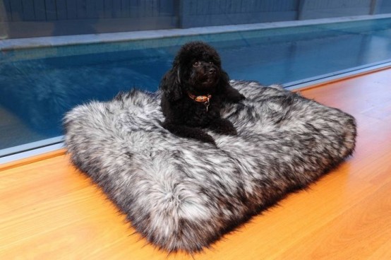an oversized faux fur cushion or pet bed is a lovely and super warm and cozy idea to rock