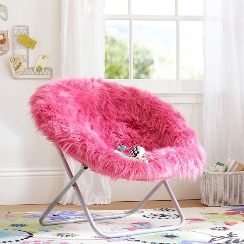 a cool hot pink faux fur chair is a lovely bright and glam piece to rock, it will add color and coziness to the space