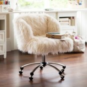 a white faux fur chair on casters is a timeless idea for a modern space, it’s a cool and stylish idea that matches many spaces