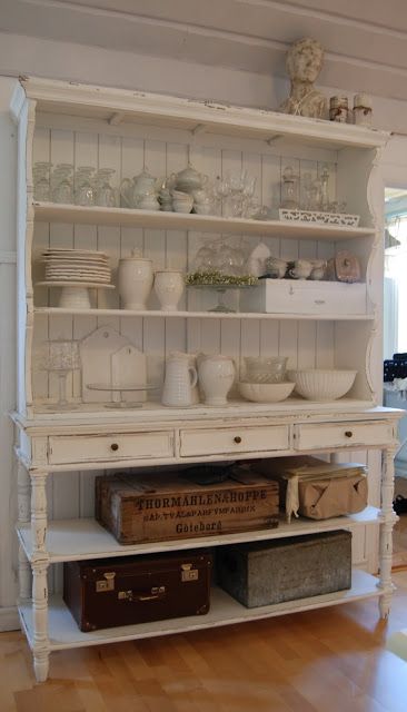 a vintage whitewashed storage unit with open shelves and a row of drawers is a lovely idea for a vintage, Scandi or shabby chic space