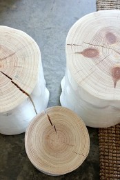 whitewashed tree stumps can be very cool and nice side and end tables, they will easily bring a touch of nature to the space and you will reuse old trees