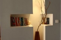 a cross shaped niche shelf with additional light will be a great storage space and will be your beautiful decor at the same time