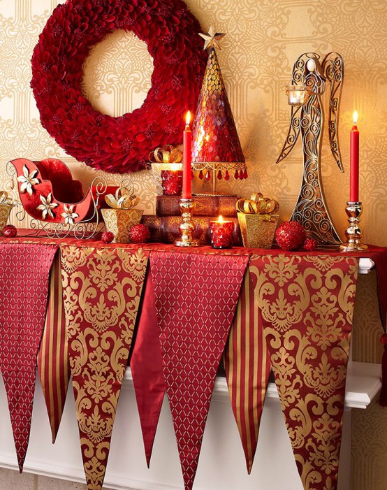 a refined red and gold Christmas table with table runners, candles, a rhinestone Christmas tree