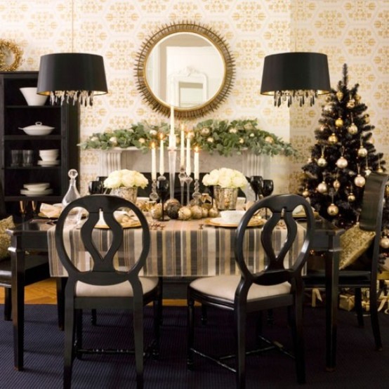 a glam white, gold and black Christmas tablescape with white florals, thin and tall candles, gold glitter ornaments and chargers
