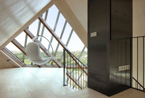 Angular Beach Home That Blends In With The Dunes