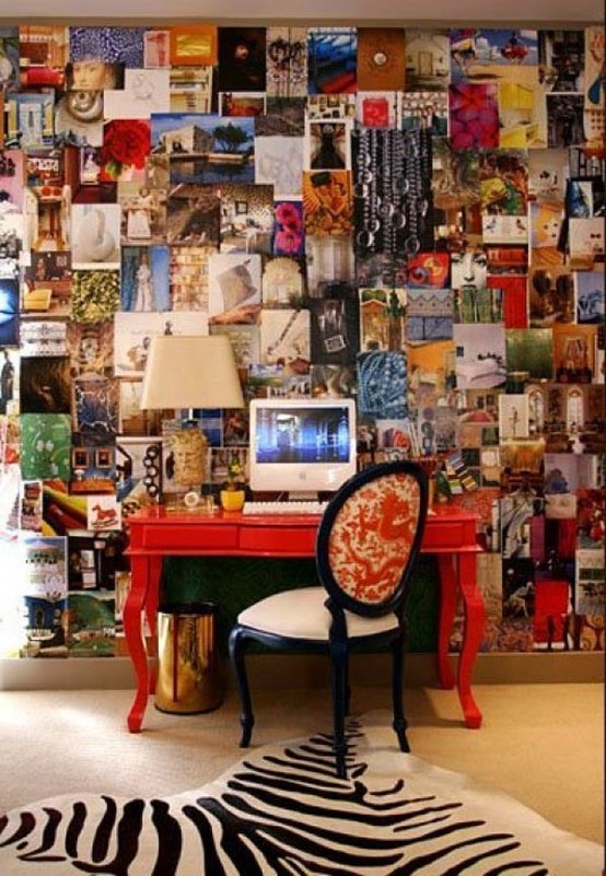 a jaw-dropping creative working space with a red vintage desk, a printed chair and an inspiring wall plus a zebra-printed rug on the floor to make the spot bolder