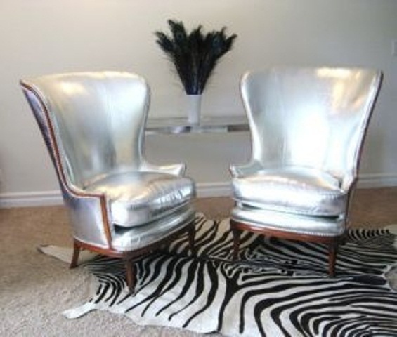 silver wingback chairs and a zebra print rug to make the spot bolder and cooler and give it a more eye catchy look