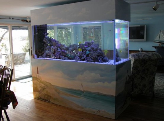 an aquarium with the sea painted on the stand is a gorgeous idea for those who love the sea and sea creatures