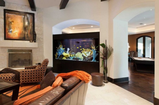 a built-in aquarium adds a vibrant and natural feel to the living room decor