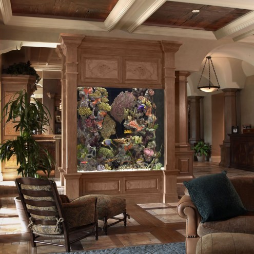 a refined and chic living room with an oversized wood-clad aquarium instead of a TV, which is a great solution