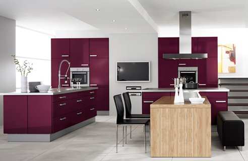 a minimalist aubergine and white kitchen with gey touches, black furniture and stainless steel appliances