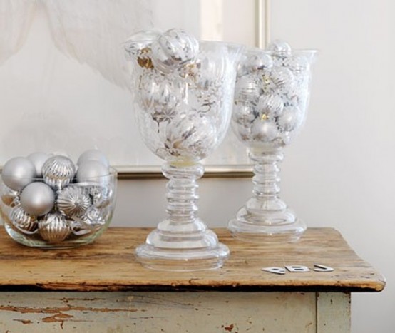 frosted glass jars and a bowl with silver ornaments are nice to decorate tables, shelves, a mantel and other places