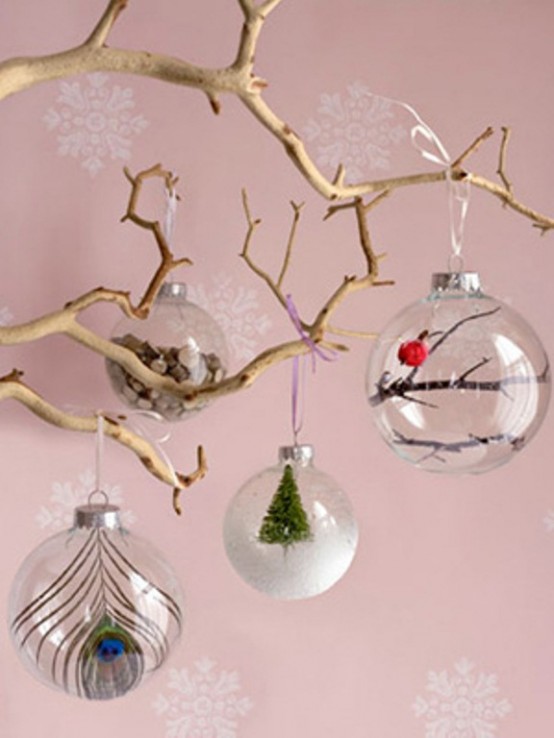 grab sheer glass ornaments and fill them with whatever you like - feathers, mini trees, faux snow and so on to create a cool combo