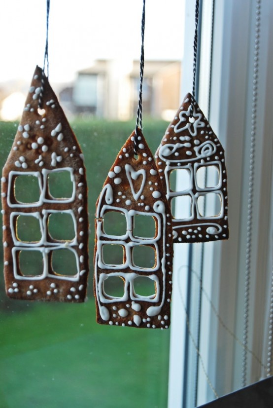Two-dimensional gingerbread houses would add a cozy and fun touch to your window's decor.