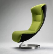 a beautiful neon green and black chair with an armchair silhouette but no armrests and a tall stand is an eye-catchy and bold idea