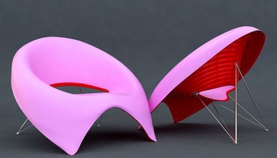 neon pink chairs shaped as donuts and placed on legs are a lovely idea for indoors and outdoors, bring a neon touch to the space